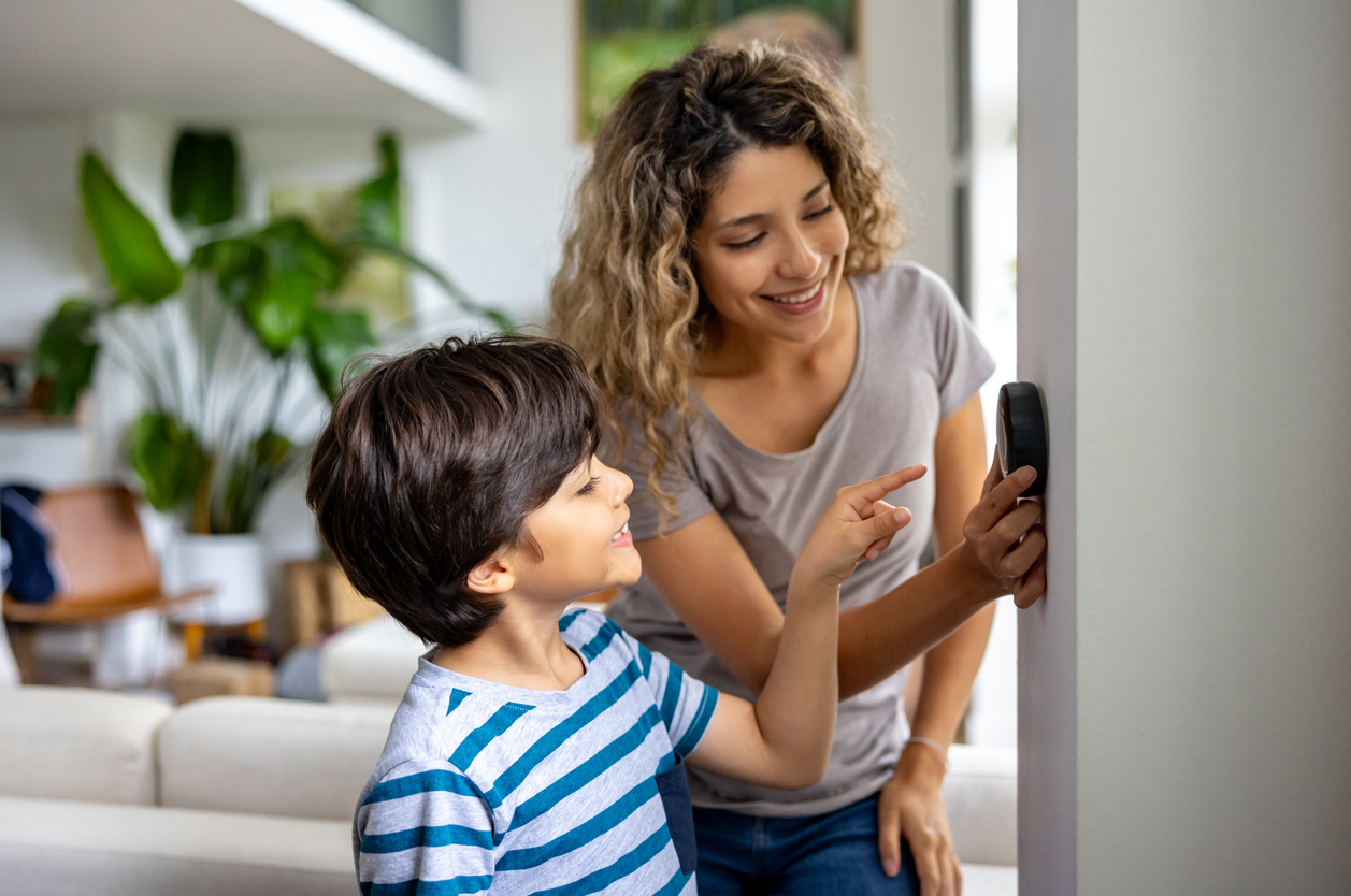 Family Using Thermostat